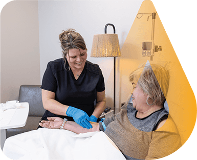 Nurse with Patient getting infusion care
